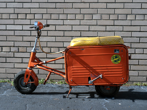 suitcase moped